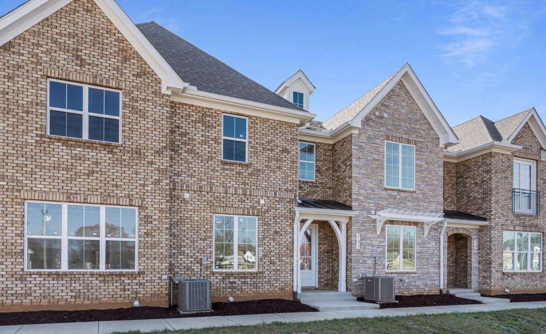 a brick building with a driveway